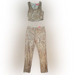 Gold sequined two-piece outfit. Never worn. Top M and bottom L.